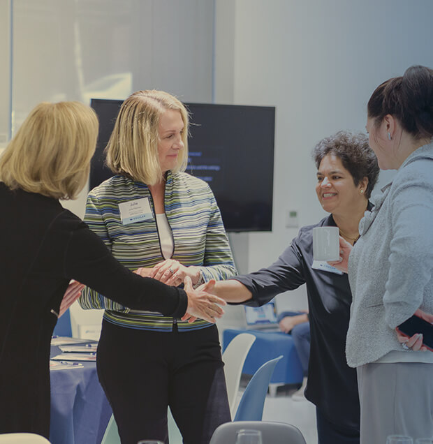 Group of people shaking hands