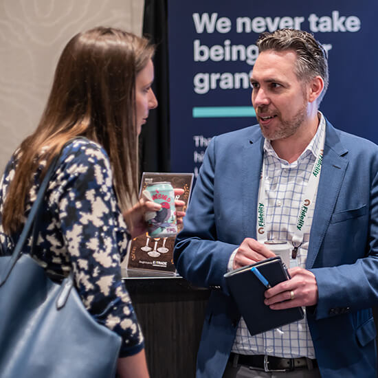 Two people networking at an Equilar Event